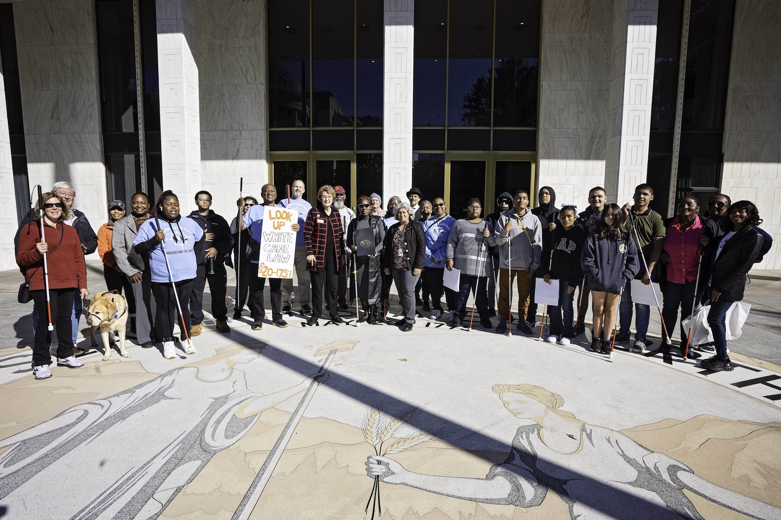 A group walks to the Legislature in Raleigh on White Cane Day.